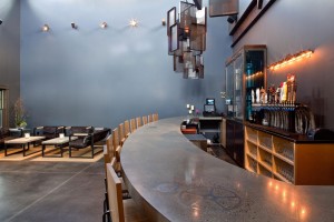 Concrete bar detail with inlaid gears